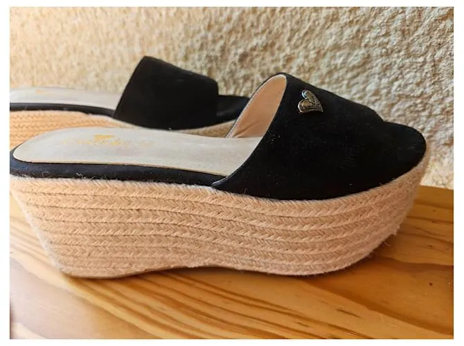 Braccialini Mulas de cuña Negro 
