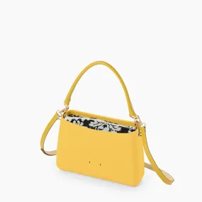 O bag glam curry y tela adamascada negro